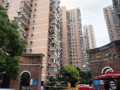 公寓怎么出售免税房产呢